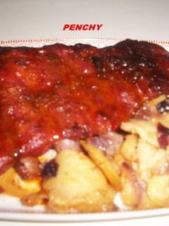 Una foto de Costillar de cerdo adobado con curry