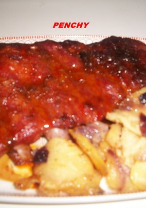 Una foto de Costillar de cerdo adobado con curry