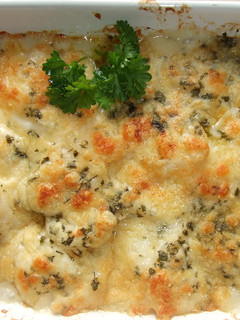 Una foto de Patatas gratinadas con queso cheddar