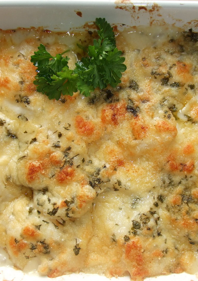 Una foto de Patatas gratinadas con queso cheddar