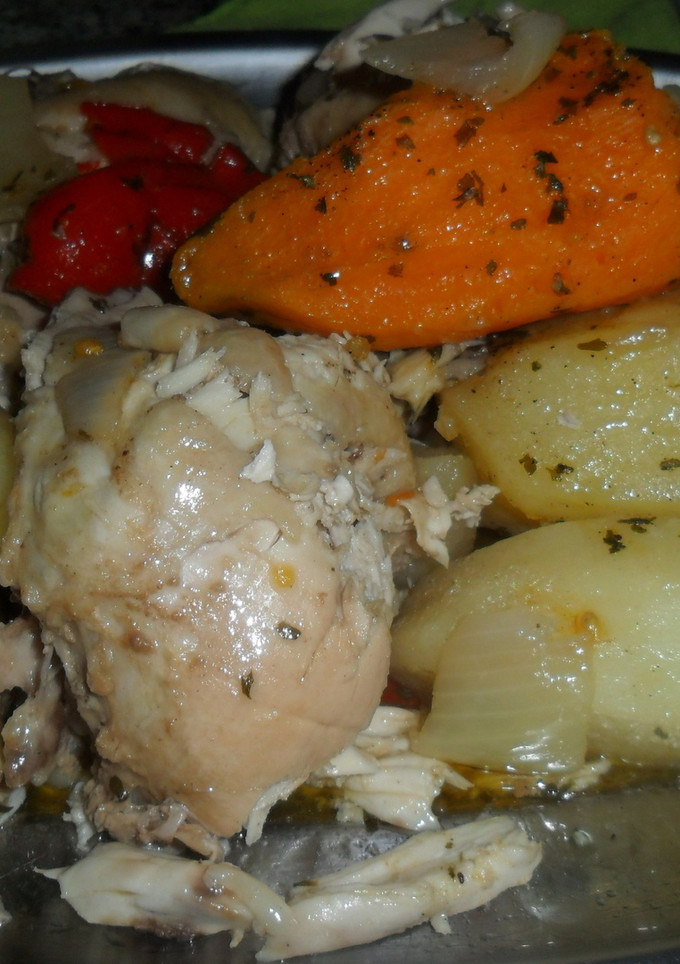 Una foto de Pollo, papas y batatas a la cerveza