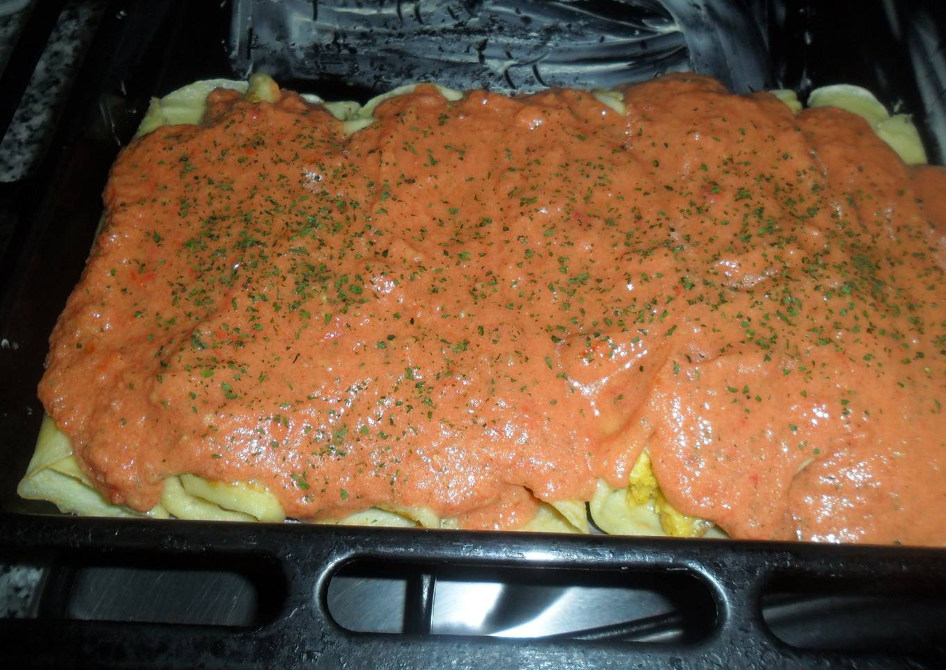 Canelones de crema de choclo con salsa de tomate<br />
