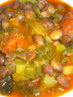 Una foto de Fabes del mandilin con repollo
