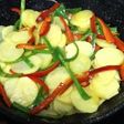 Patatas con pimientos y cebolla