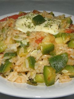 Una foto de Guiso de arroz y zapallito con queso