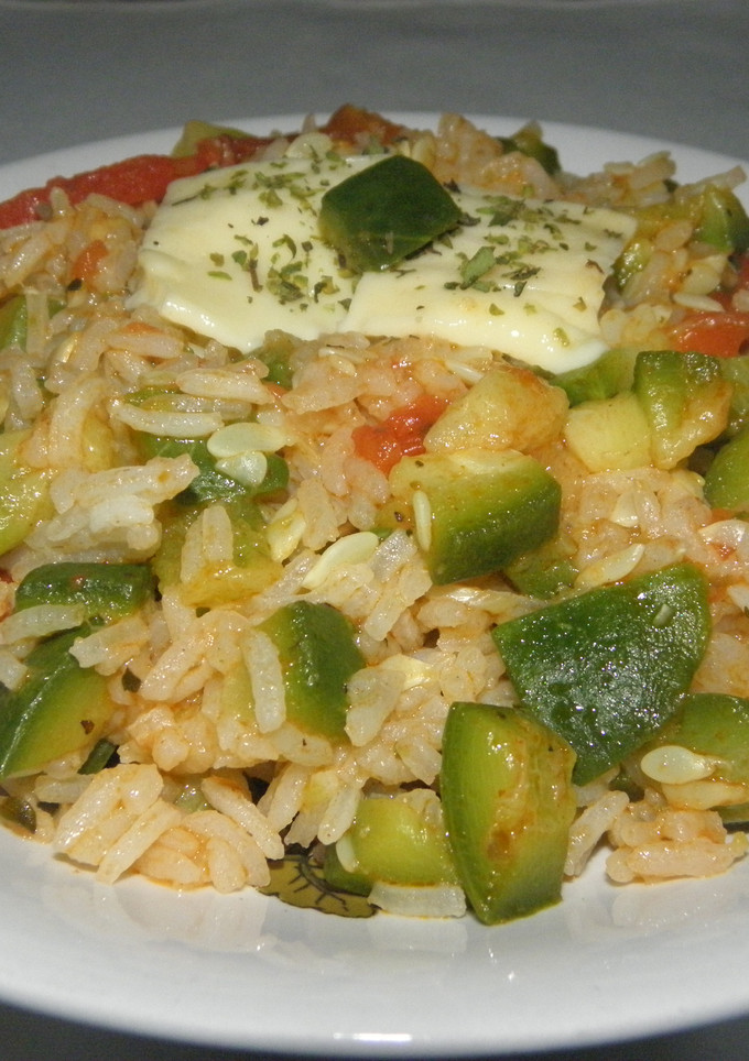 Una foto de Guiso de arroz y zapallito con queso