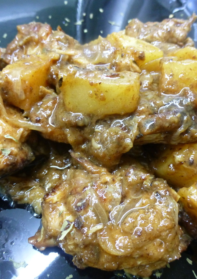 Una foto de Pollo con zumo de naranja