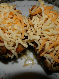 Una foto de Berenjenas rellenas de rape y jamón serrano