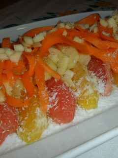 Una foto de Ensalada de cítricos con manzana, zanahoria y coco