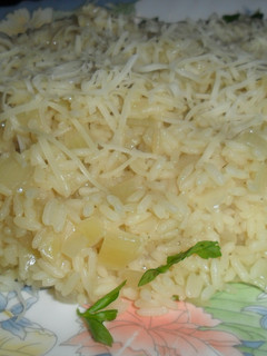Una foto de Rissotto con grana padano rallado