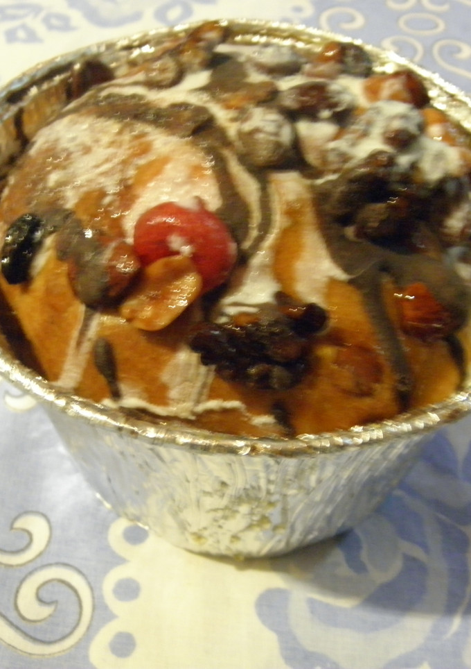 Una foto de Budín navideño de pasas y nueces