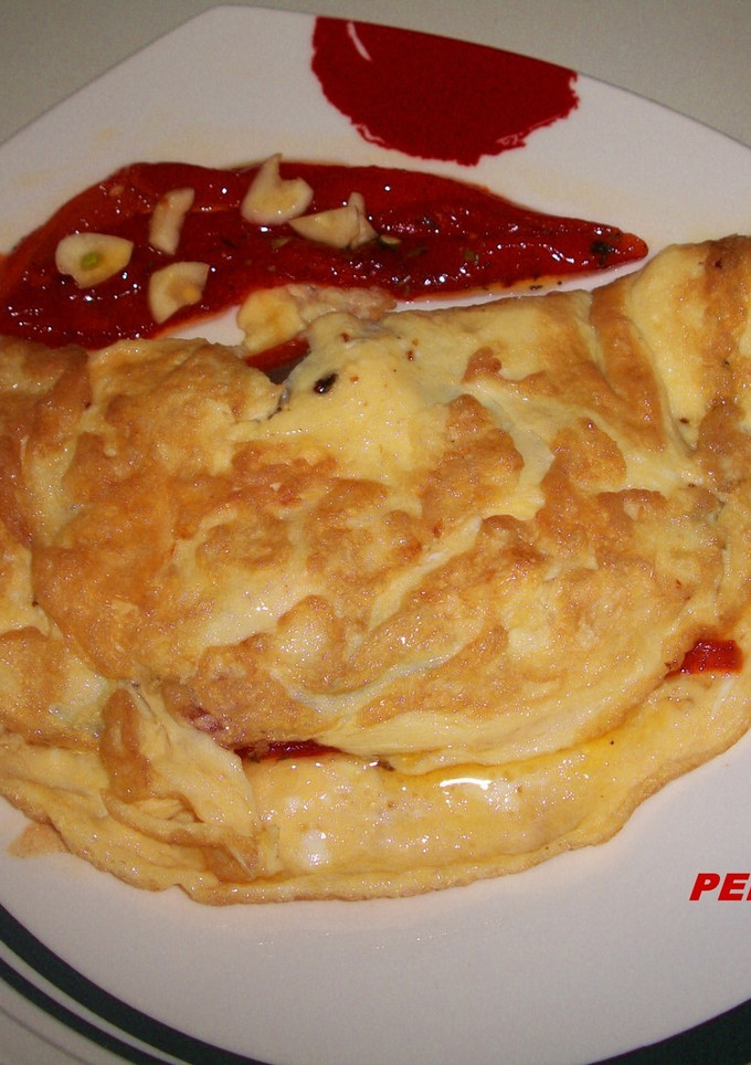 Una foto de Tortilla con pimientos asados