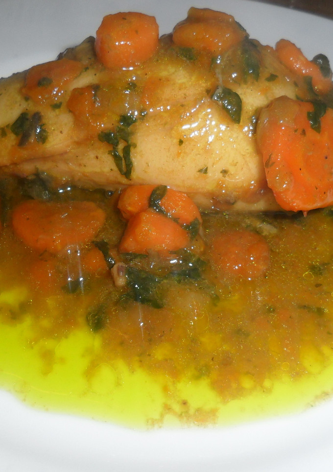 Una foto de Calamares rellenos en salsa de espinaca