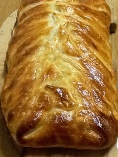 Una foto de Trenza de beicon y cuatro quesos