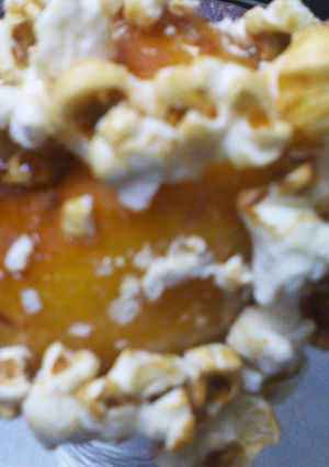 Una foto de Manzanas con caramelo y pochoclo