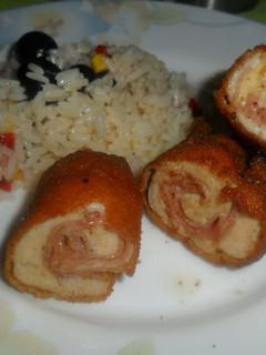 Una foto de Rollitos rebozados de pollo, jamón y queso