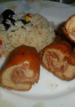 Una foto de Rollitos rebozados de pollo, jamón y queso