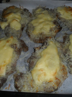 Una foto de Chuletas de cerdo rebozadas con queso