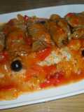 Niños envueltos de ternera con arroz blanco