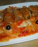 Niños envueltos de ternera con arroz blanco