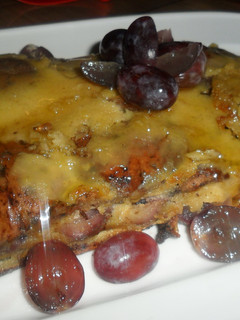Una foto de Postre de uvas con miel