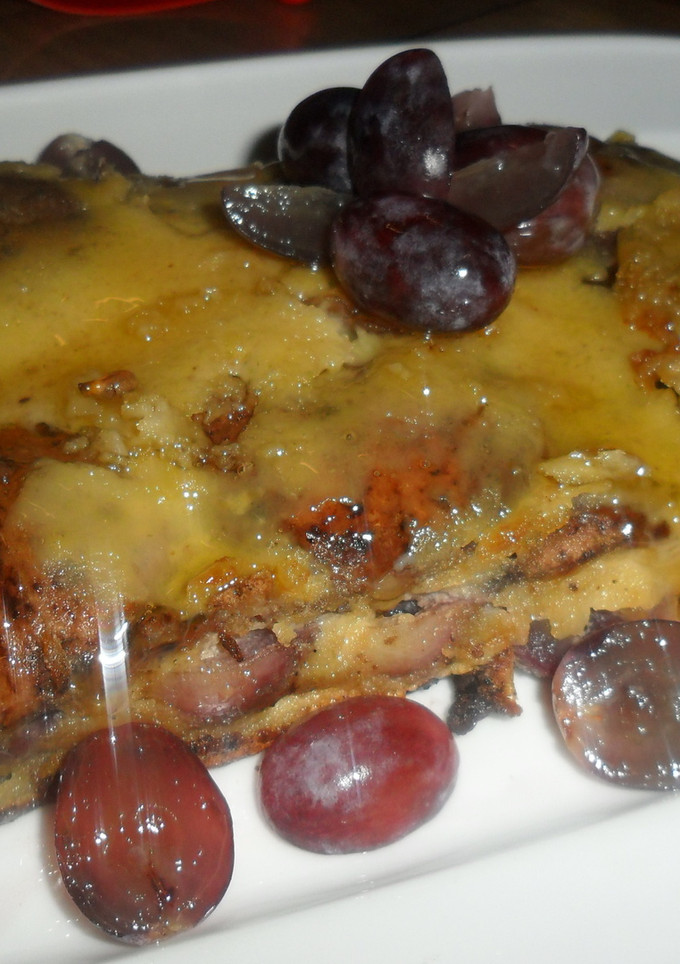Una foto de Postre de uvas con miel