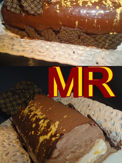 Una foto de Bûche de Noël de trufa y mango