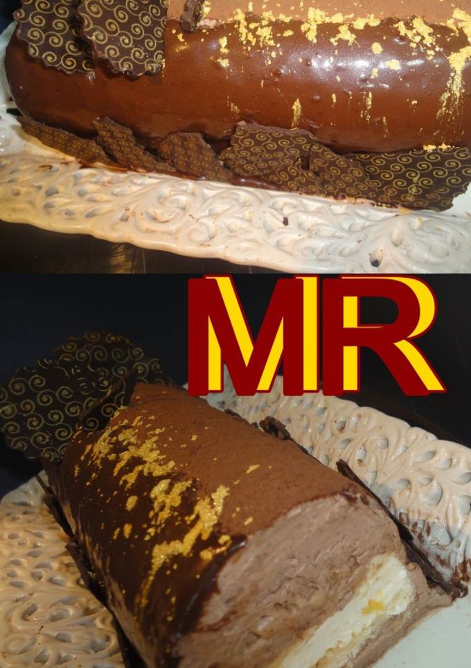 Una foto de Bûche de Noël de trufa y mango