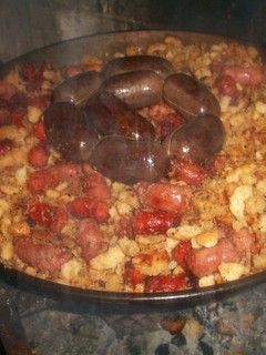 Una foto de Migas a la leña con sabor de tomillo y romero
