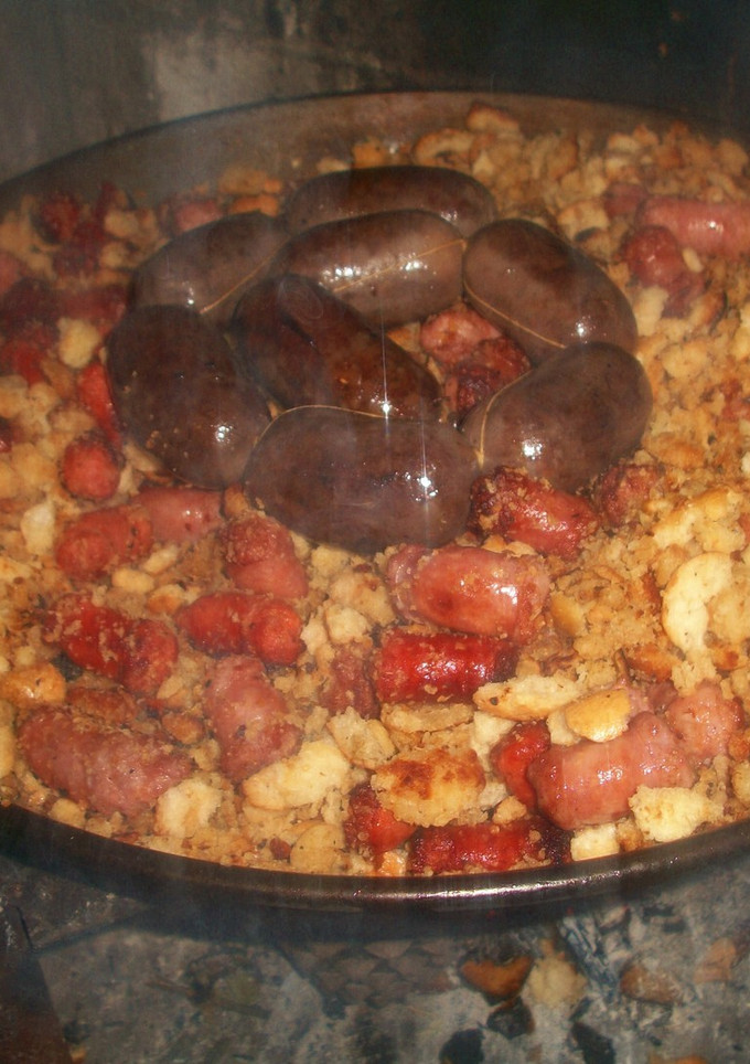 Una foto de Migas a la leña con sabor de tomillo y romero