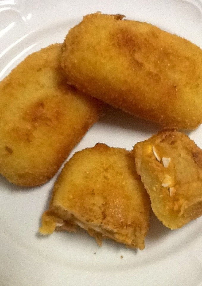Una foto de Puré de patata relleno rebozado 