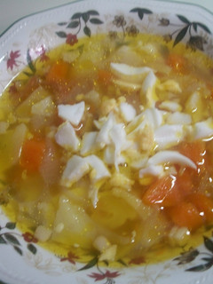 Una foto de Sopa de verduras con jamón Ibérico