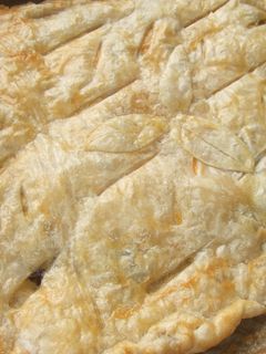 Una foto de Empanada hojaldrada de setas al ajillo