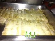 Una foto de enchiladas de pollo y queso