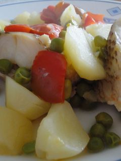 Una foto de Pinto con guisantes y pimiento