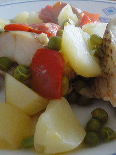 Una foto de Pinto con guisantes y pimiento