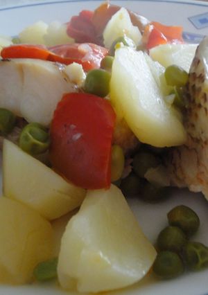 Una foto de Pinto con guisantes y pimiento