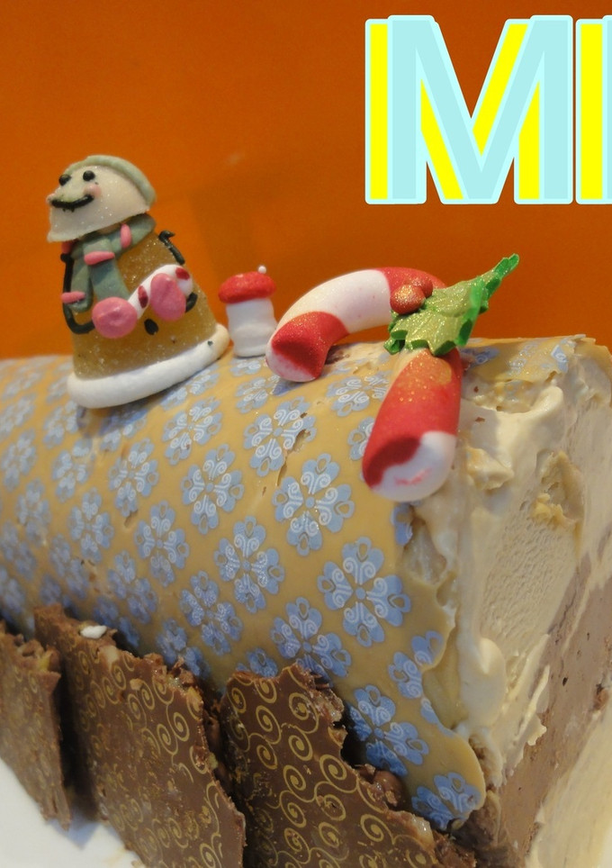 Una foto de Bûche de Noël de biscuit y trufa