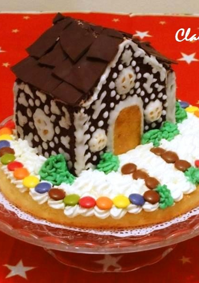 Una foto de Tarta navideña "Casita de chocolate"