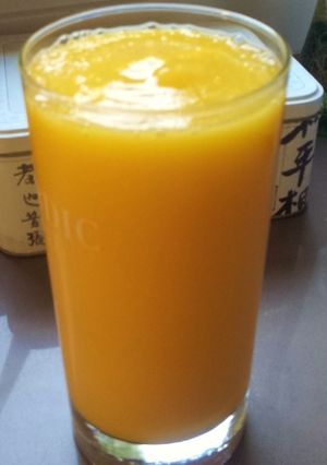 Una foto de Batido de mango, pera y naranja