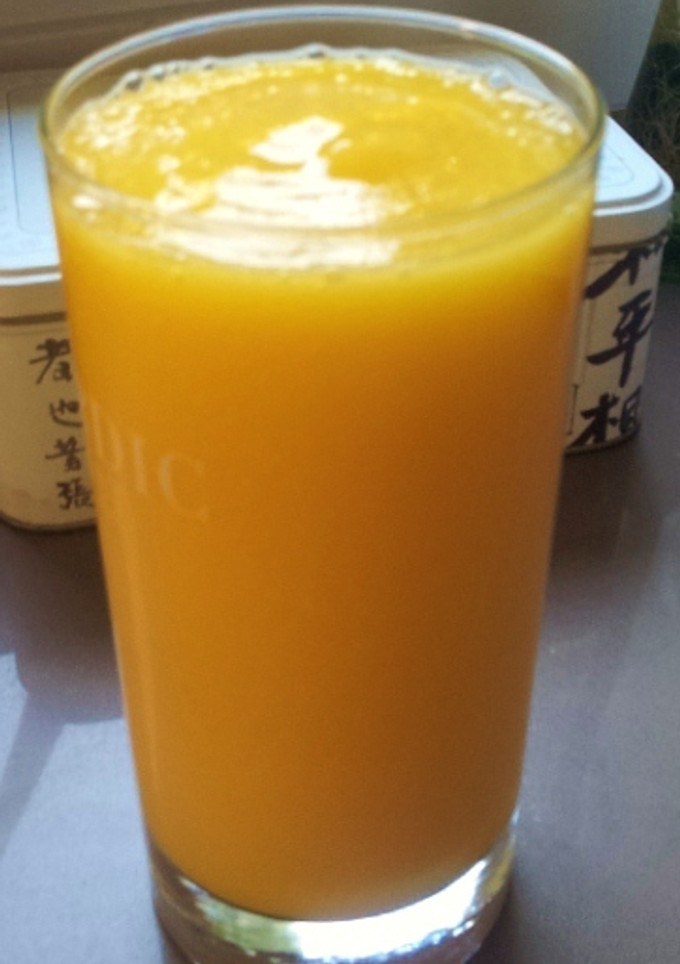 Una foto de Batido de mango, pera y naranja