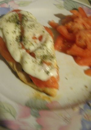 Una foto de Pechugas de pollo a la pizza