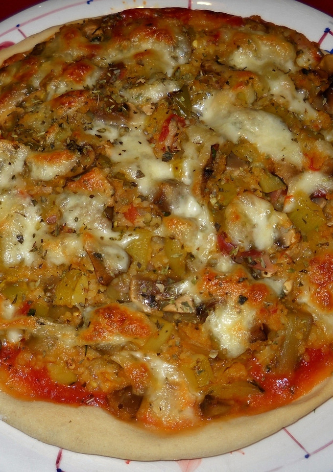 Una foto de Pizza de calabacín y champiñones