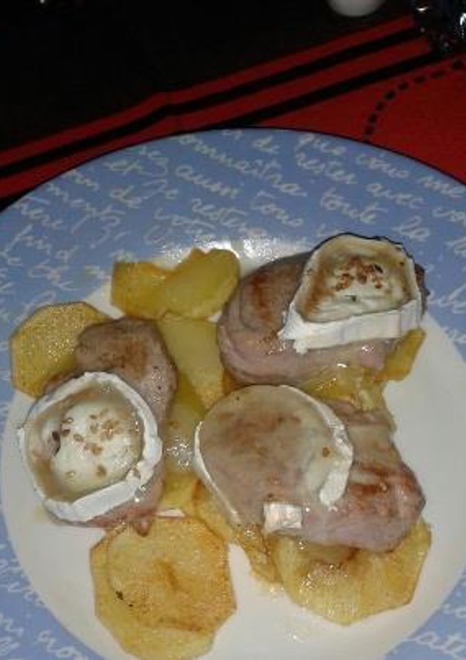 Una foto de Medallones de solomillo en un lecho de patatas