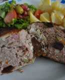 Pollo relleno de carne y frutos secos