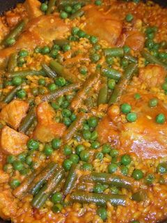 Una foto de Arroz con secreto ibérico y pollo