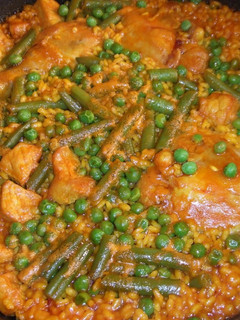 Una foto de Arroz con secreto ibérico y pollo