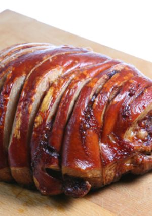 A picture of Oven-Baked Stuffed Pork Leg.