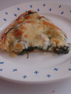 Una foto de Quiche Vosgienne de espinacas con mix de queso gratinado