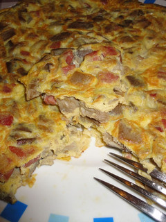 Una foto de Tortilla de setas frescas y jamón